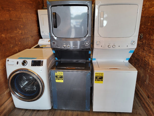 Pictured are laundry centers and a front load dryer from Costco scratch and dent program.